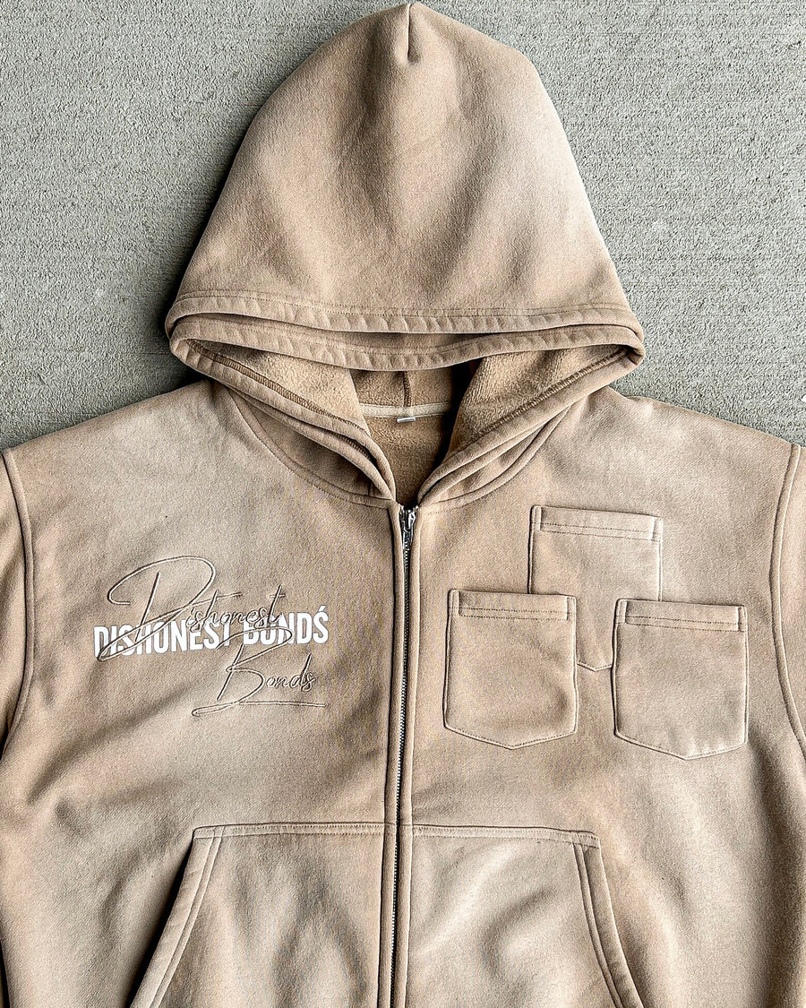 DISHONEST “SAND” BROWN